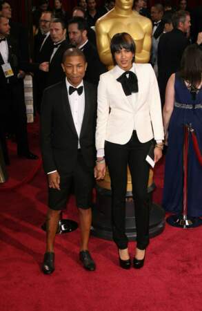 On aime le look de Pharrell Williams et de Helen Lasichanh sur le tapis rouge