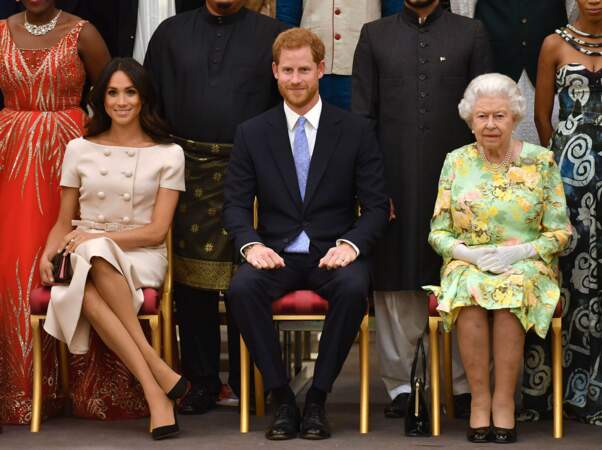 Harry entre les deux femmes de sa vie : Meghan et la reine Elizabeth II.