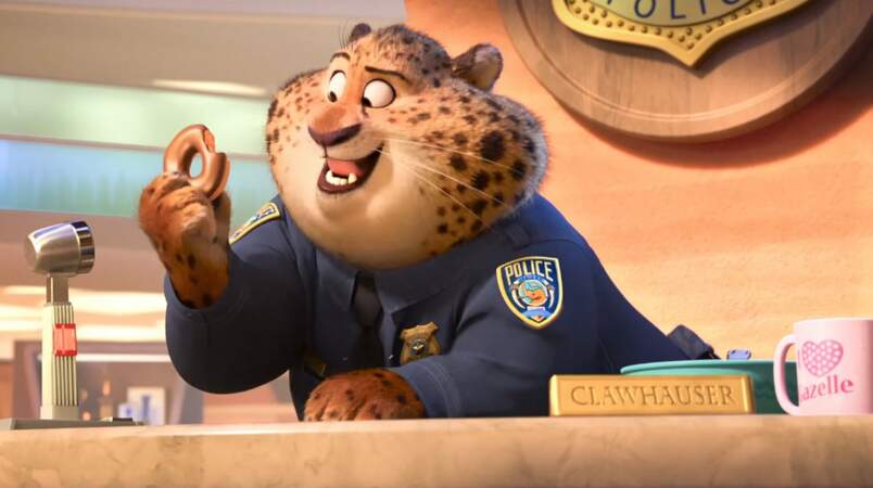 Dans Zootopie de Disney, l'officier Clawhauser A-DO-RE les beignets plein de sucre ! 