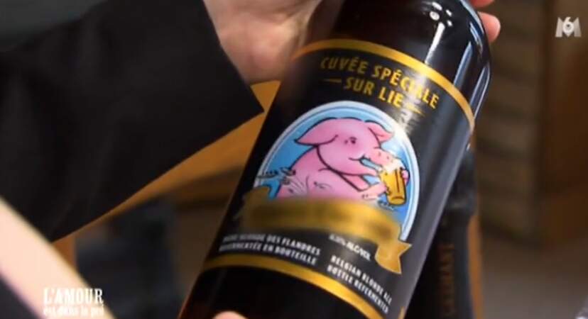 1er cadeau pour l'éleveur de porcs picard : du Rince Cochon, une bière des Flandres