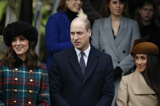 Le prince William, entouré de Kate Middleton et de Meghan Markle