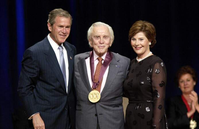 Avec George et Laura Bush en 2002