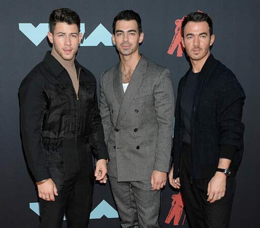 Une brochette de Jonas : Nick, Joe et Kevin.  