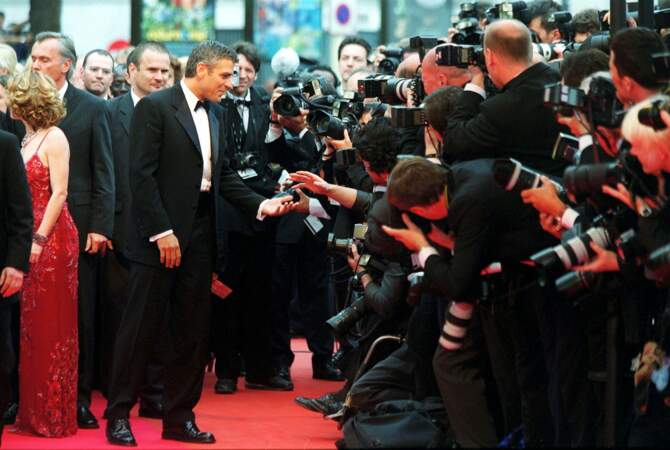 George Clooney, véritable star lors de sa montée des marches pour "O'Brother" des frères Cohen la même année.