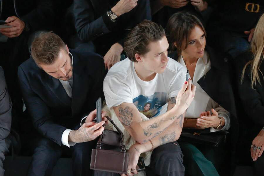 Sortie en famille aussi pour les Beckham au défilé Dior Homme