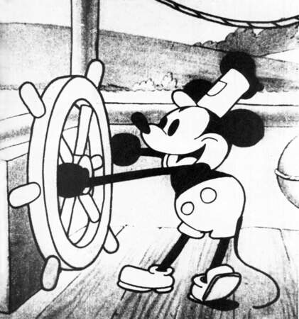 Pour sa première apparition en 1928, Mickey Mouse ne porte pas de gants et a de très longs bras