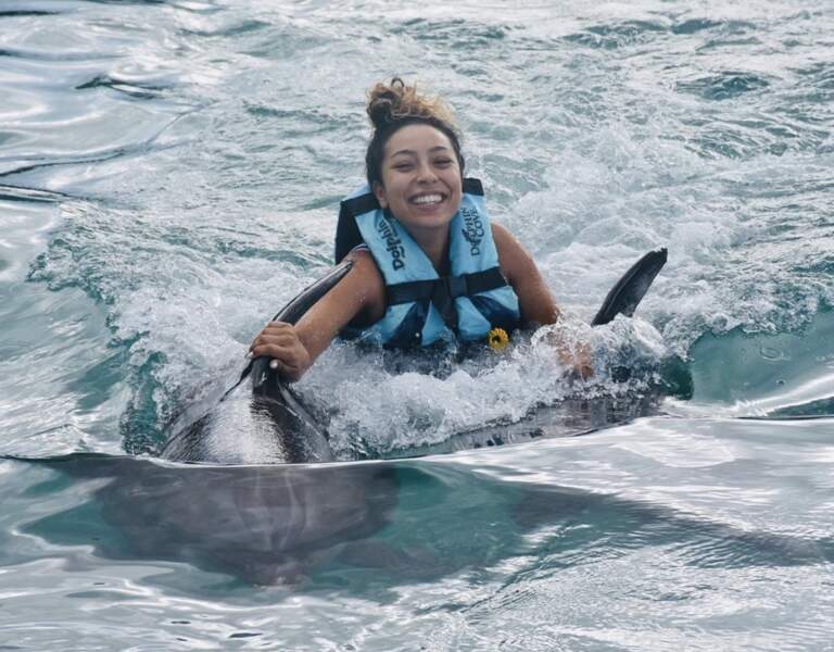 Et des moments privilégiés comme cette fois où elle a nagé avec des dauphins en Jamaïque