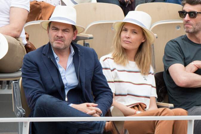 Même chapeau, même regard pour Clovis Cornillac et sa femme en 2019