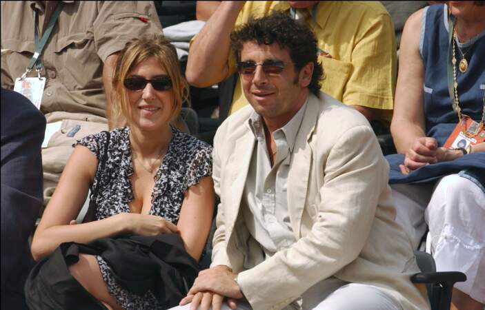 Patrick Bruel et Amanda Sthers lors d'un match dans les tribunes de Roland Garros en 2004