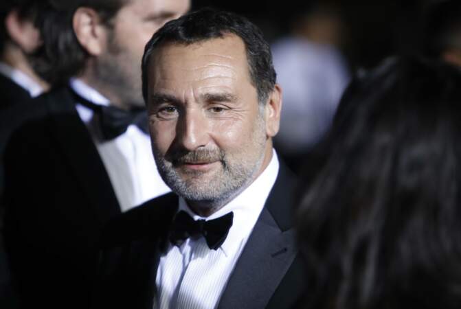 Gilles Lellouche, choisi pour le rôle de Benzène dans "Fumer fait tousser", lors de la montée des marches au 75e Festival de Cannes, samedi 21 mai.