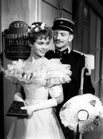 1955 : elle apparaît dans Les grandes manoeuvres de René Clair, dans le rôle de Lucie