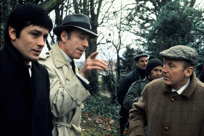 Bourvil avec Yves Montand et Alain Delon lors du tournage du "Cercle rouge" de Jean-Pierre Melville, en janvier 1970.
