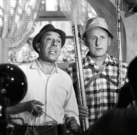 Bourvil et Fernandel sur le tournage du film "La Cuisine au beurre" en 1963.