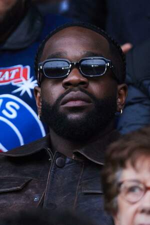 Le chanteur Tayc dans les tribunes du Parc des Princes.